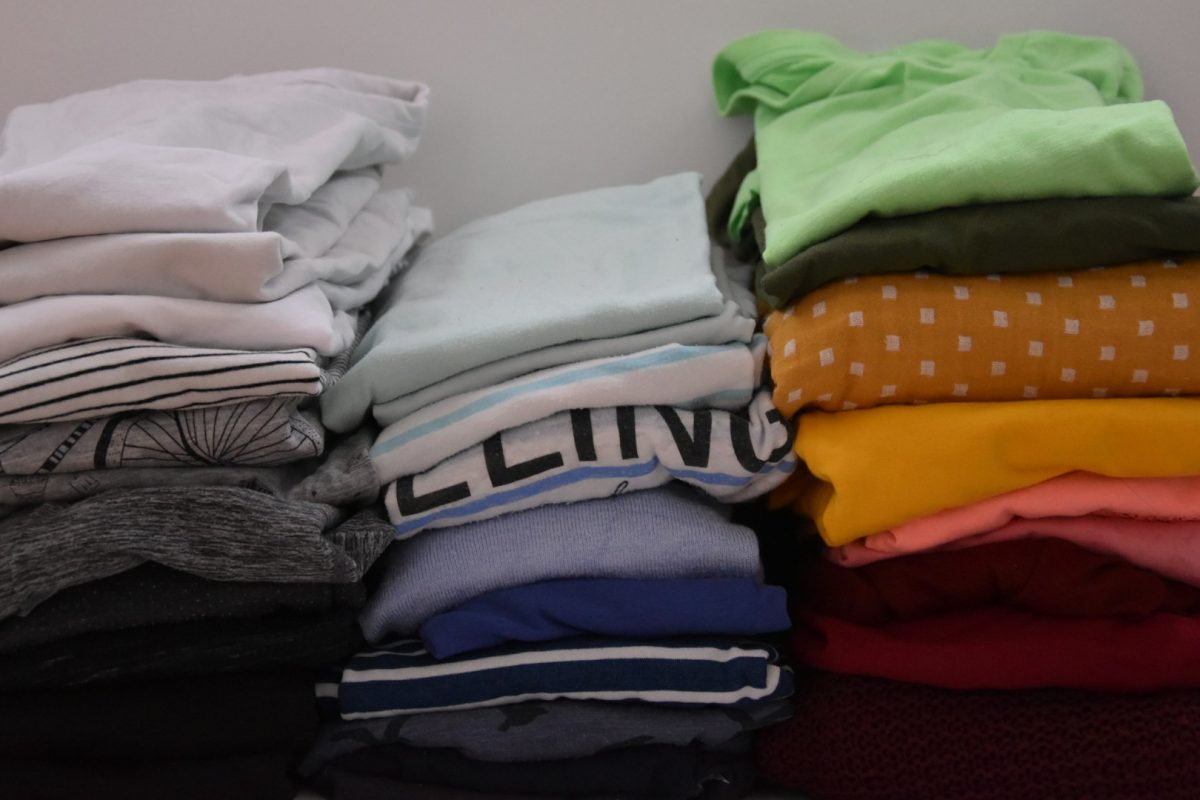 stack of old t-shirts on bed2.jpg